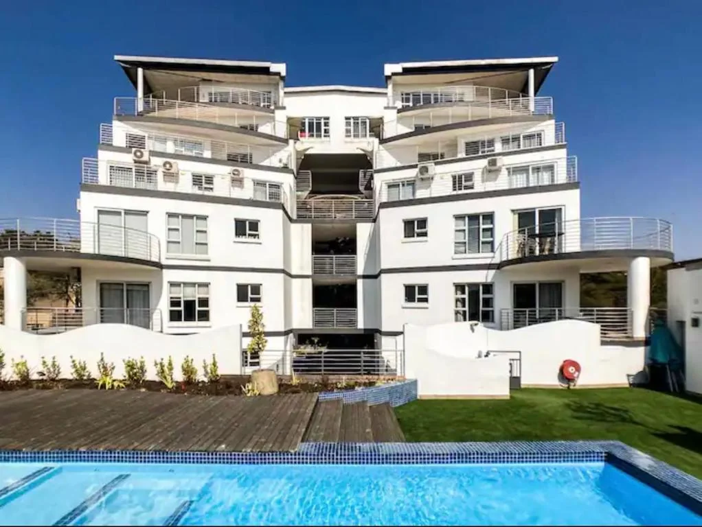 SPLICE RIVIERA building viewed from the swimming pool
